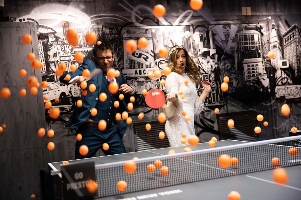 Chris and Louise playing a game of ping pong
